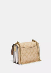 Coach Mini Klare Crossbody Signature Blanca/Crema