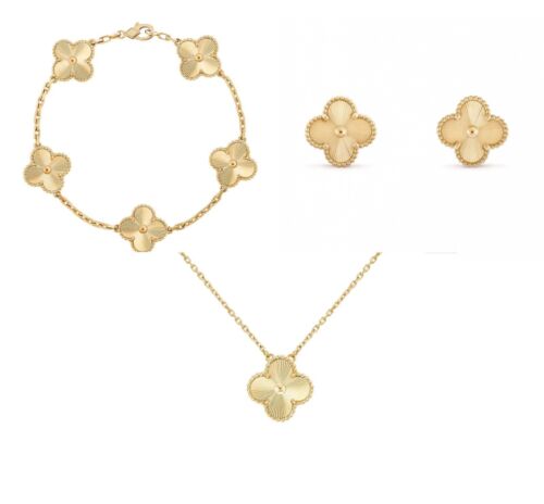 6614ec0e5223b07acd49a99e-van-cleef-gold-motif-clover-3-piece-set.jpg