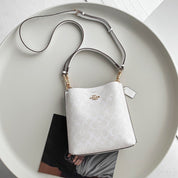 Coach Bucket Mollie Signature Chalk Interior Rojo